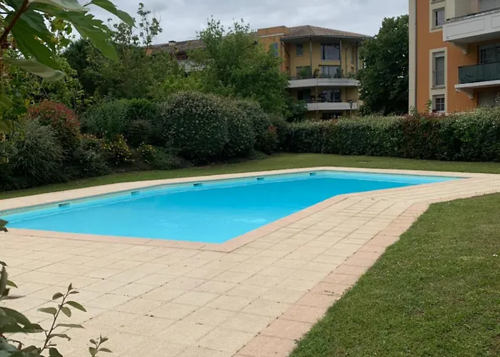 City Rose T2,Clim , Parking Prive, Piscine, Tout Confort